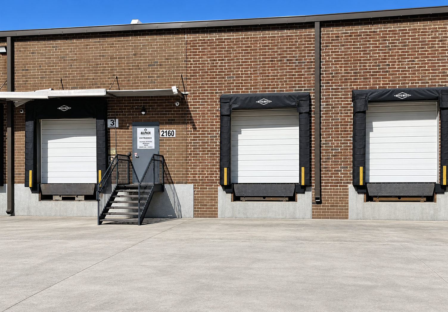 Loading docks and tenant entrance at Creedmoor Business Park