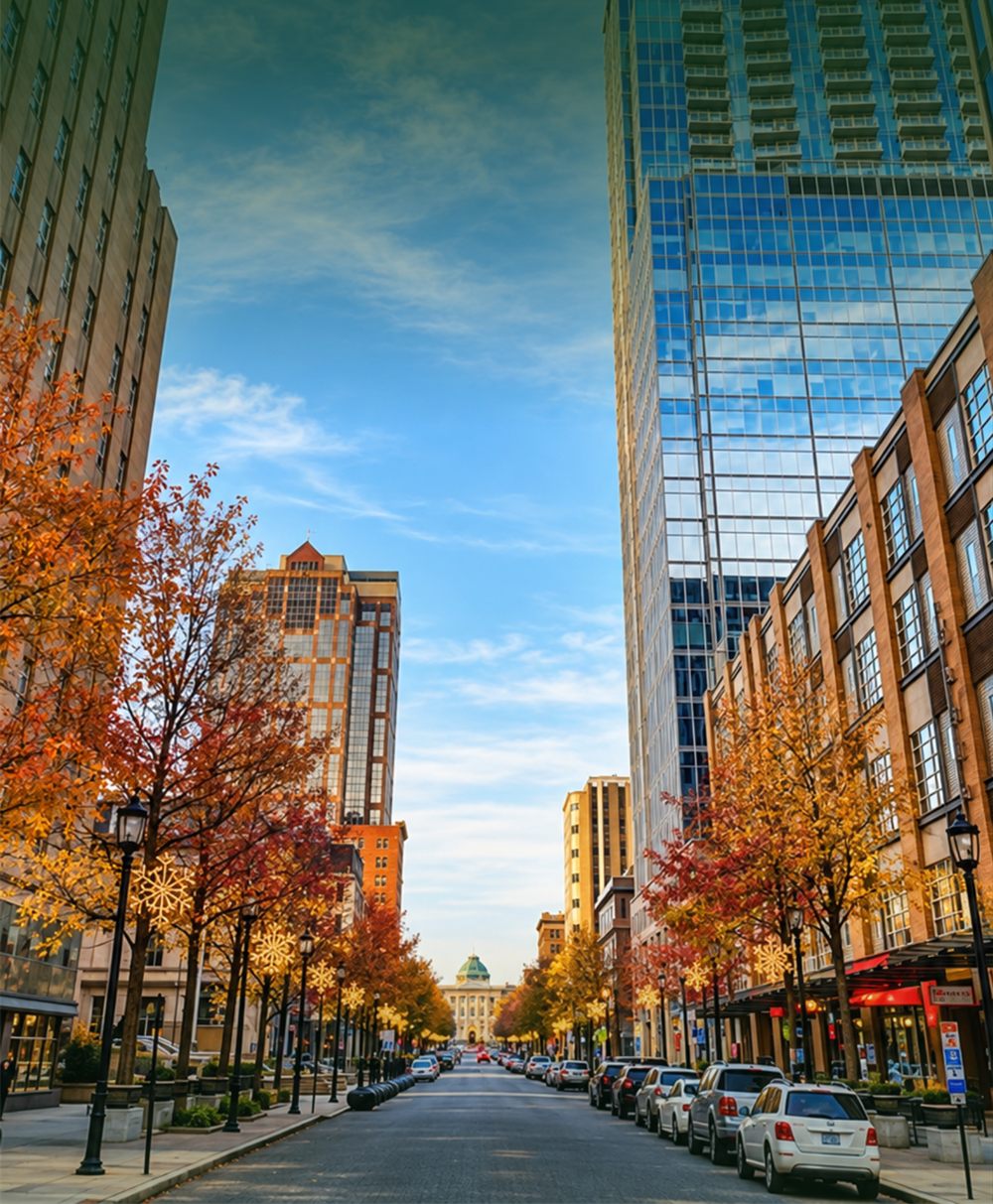 Fayetteville Street in downtown Raleigh in the fall, looking toward the State Capitol